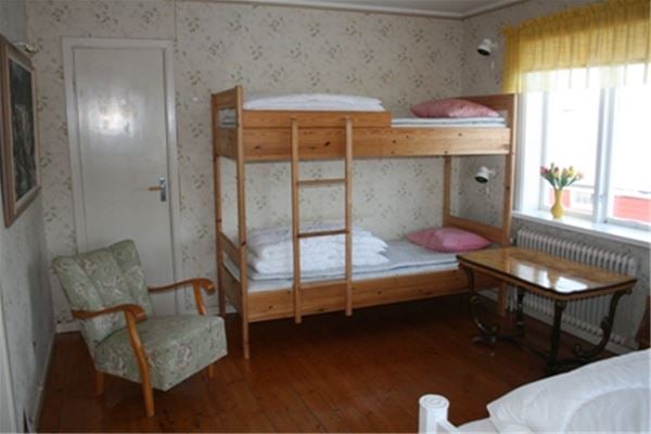 Room with a bunk bed. 