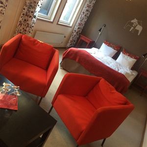 Room with red chairs.