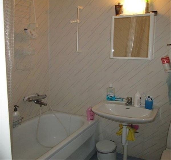 Bathroom with a bath tub. 