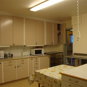 Large kitchen with microwave ovens.