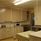 Large kitchen with microwave ovens.