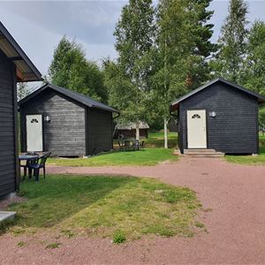 Black small cabins.