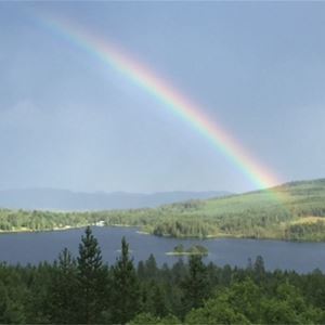 Rainbow over a lake.