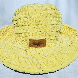 Crocheted yellow hat. 