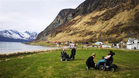 Four guest enjoying the view of mountains