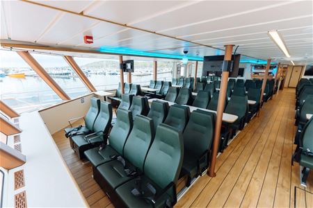 Side view of the catamaran's lounge with a view out of the windows