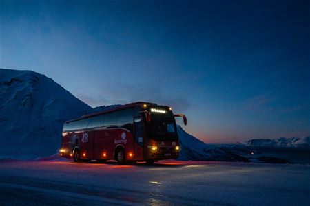Evening photo of the Arctic Route bus