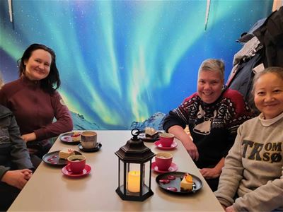 Guests enjoy drink and sweets at a local restaurant.