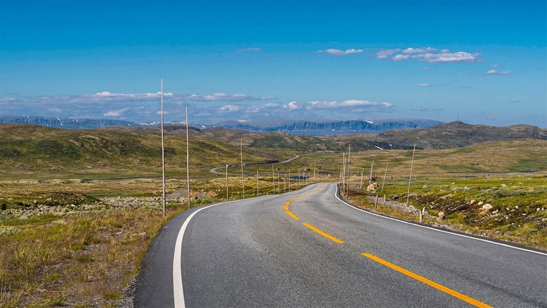 Road 7 towards Geilo  from the Hardangervidda, at the horizon national park Hallingskarvet. Location Skulevik