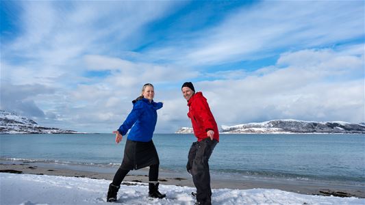 Two guests posing in the Arctic nature