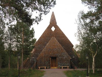 A chapel surrounded by trees