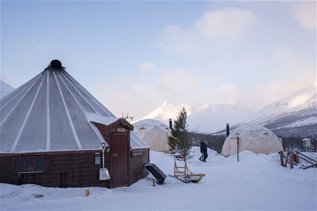 Photo of the camp, the lavvu, and the overnight domes at Lyngsfjord Adventure