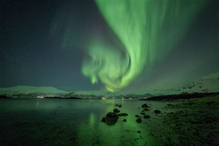 Northern lights over mountains