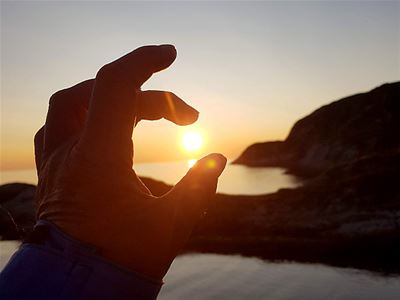 Person "holding" the sun 