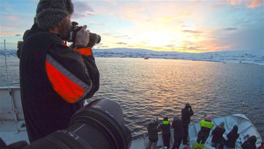 A person taking pictures