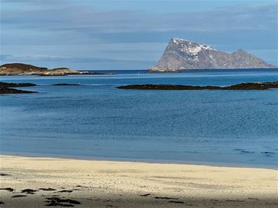 View of sandy beach and the mountain of Håja