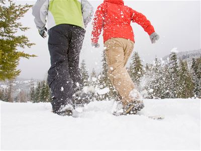Guests running with snowshoes