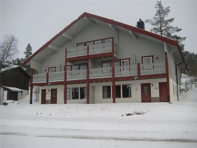 Exterior of an cottage during winter.