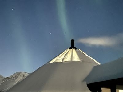 Cabin and northern lights