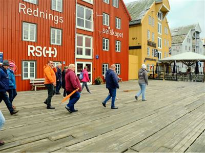 Guests walking along the dock in Tromsø