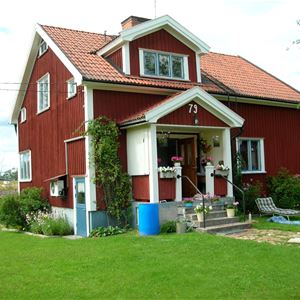 Exterior of redpainted house.