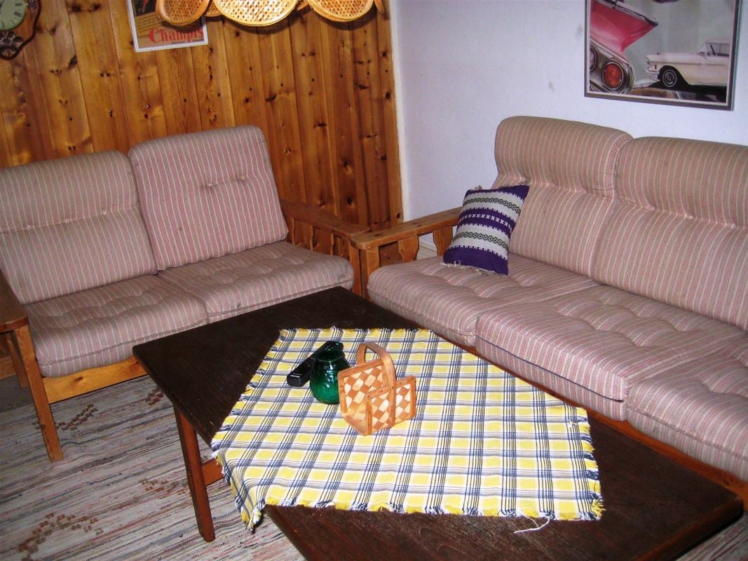 Two sofas and a table.