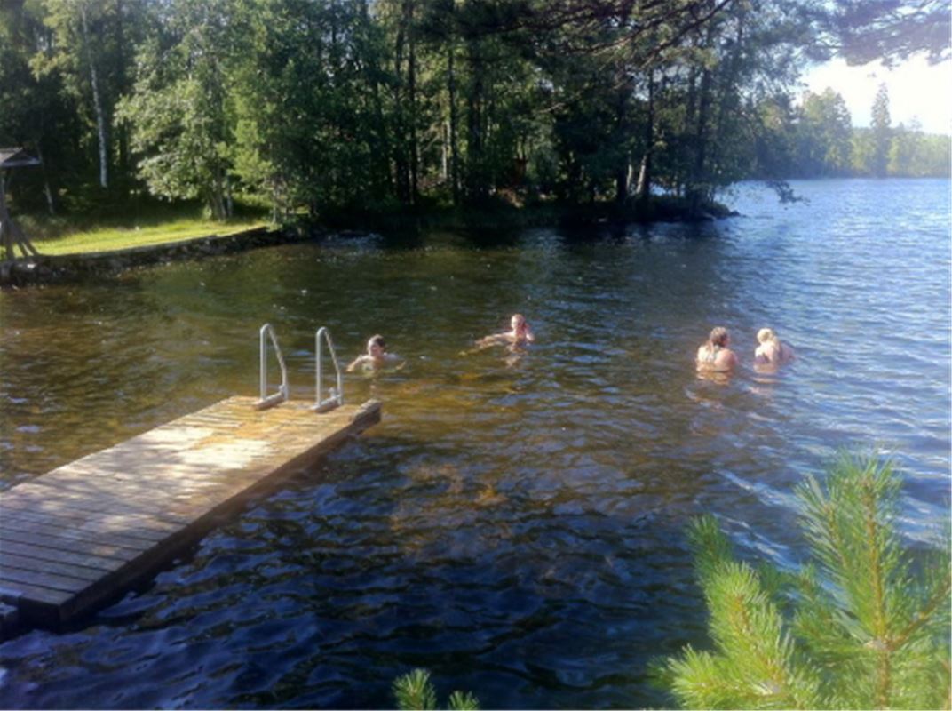 Visitors swiming in the lake.