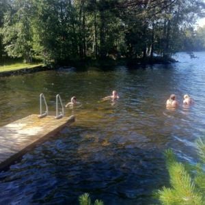 Visitors swiming in the lake.
