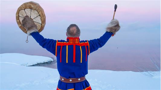 Sámi shaman with a drum