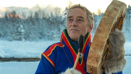 Sámi shaman with a drum