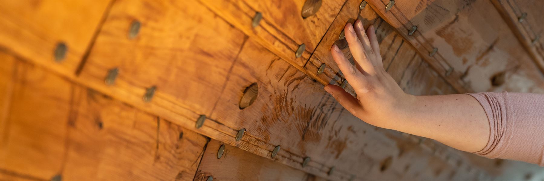 Close-up of detailed woodwork from the reconstruction of the Myklebust Ship.