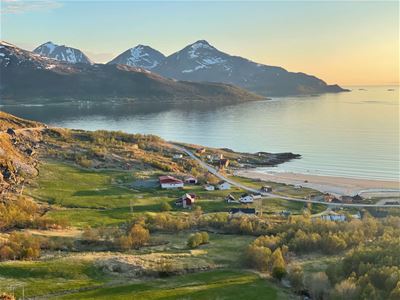 View of a small village, mountains and the sea