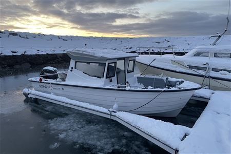 A boat moored at the quay in winter