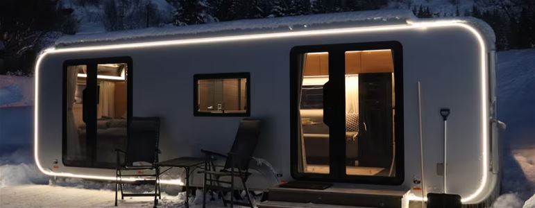 he accommodation seen from the outside in a winter landscape