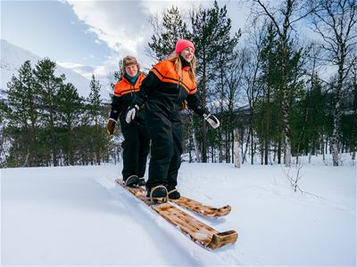 Two guests skiing