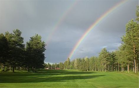 Rainbow over the golf-club.