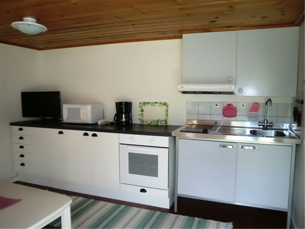 Pentry with white cabinet doors. 