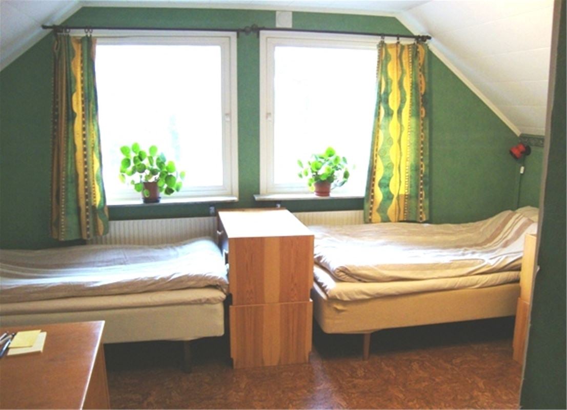 Two single beds on top floor.