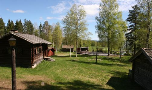 Exterior image, older log houses.