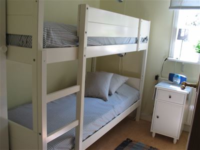 Guest room with a bunkbed.
