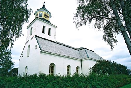 Sollerö church between two birches.