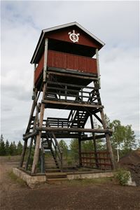 Lookout tower built in wood with a couple of floors.