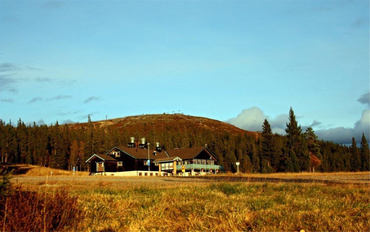 The main building with mountain surroundings.