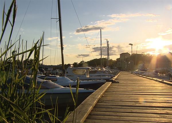 Guest harbor jetty with boats 