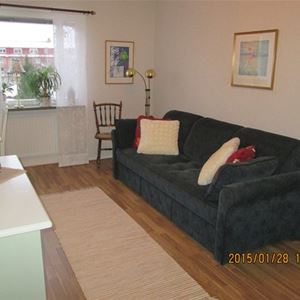 A room with a sofa.