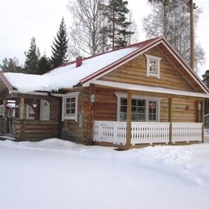 Log cabin, two floors with a veranda.
