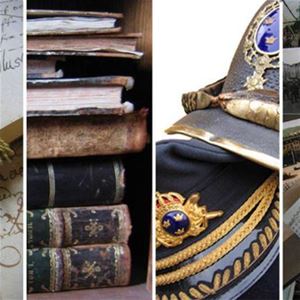 Old books, a military hat and a helmet.