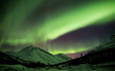 Northern lights above the mountains