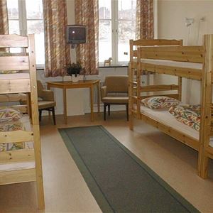 A room in the Community centre  with 4 rooms with 20 beds all together.