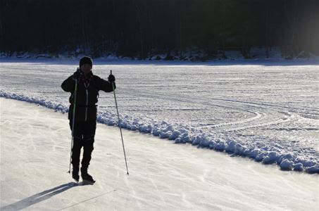 One person long distance ice skating.